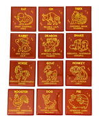 12-piece red and gold Chinese zodiac refrigerator magnet set in gift pouches.